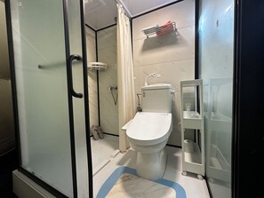 Shower, eco-friendly toiletries, hair dryer, towels