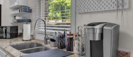 Coffee/tea maker, fridge, microwave, oven