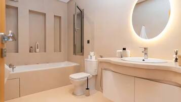 Shower, jetted tub, hair dryer, bidet