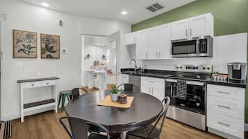 Coffee/tea maker, fridge, microwave, oven