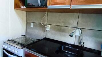 Fridge, microwave, oven, cookware/dishes/utensils
