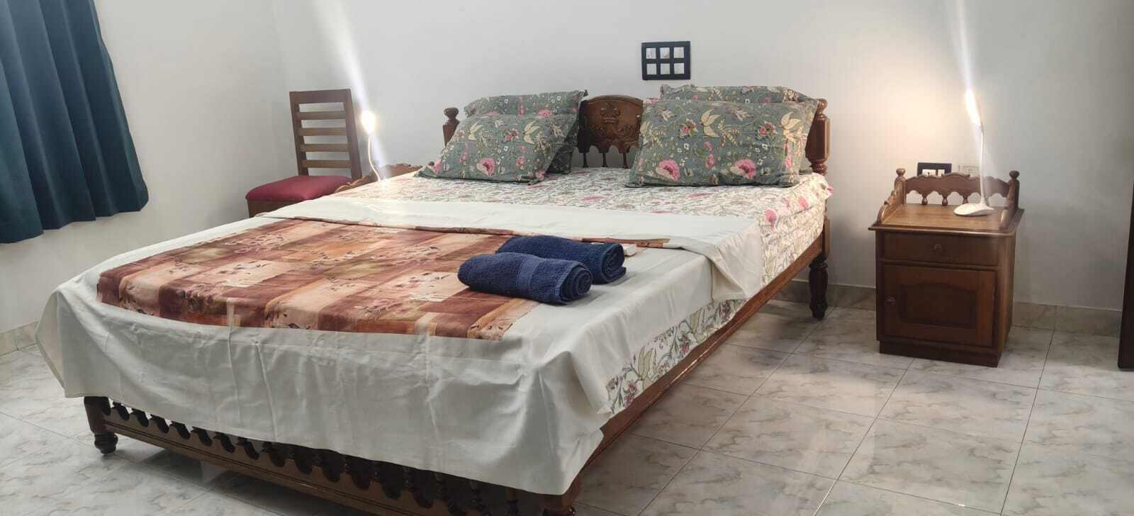 Deluxe Triple Room, Garden View | Desk, laptop workspace, free WiFi