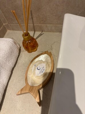 Hair dryer, towels, soap, toilet paper