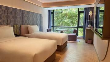 Premium bedding, down comforters, memory foam beds, minibar (free items)