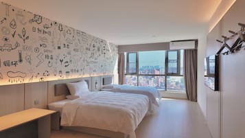 Family Triple Room | Desk, laptop workspace, blackout drapes, iron/ironing board (on request)