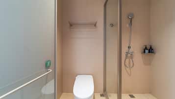 Shower, hair dryer, slippers, towels
