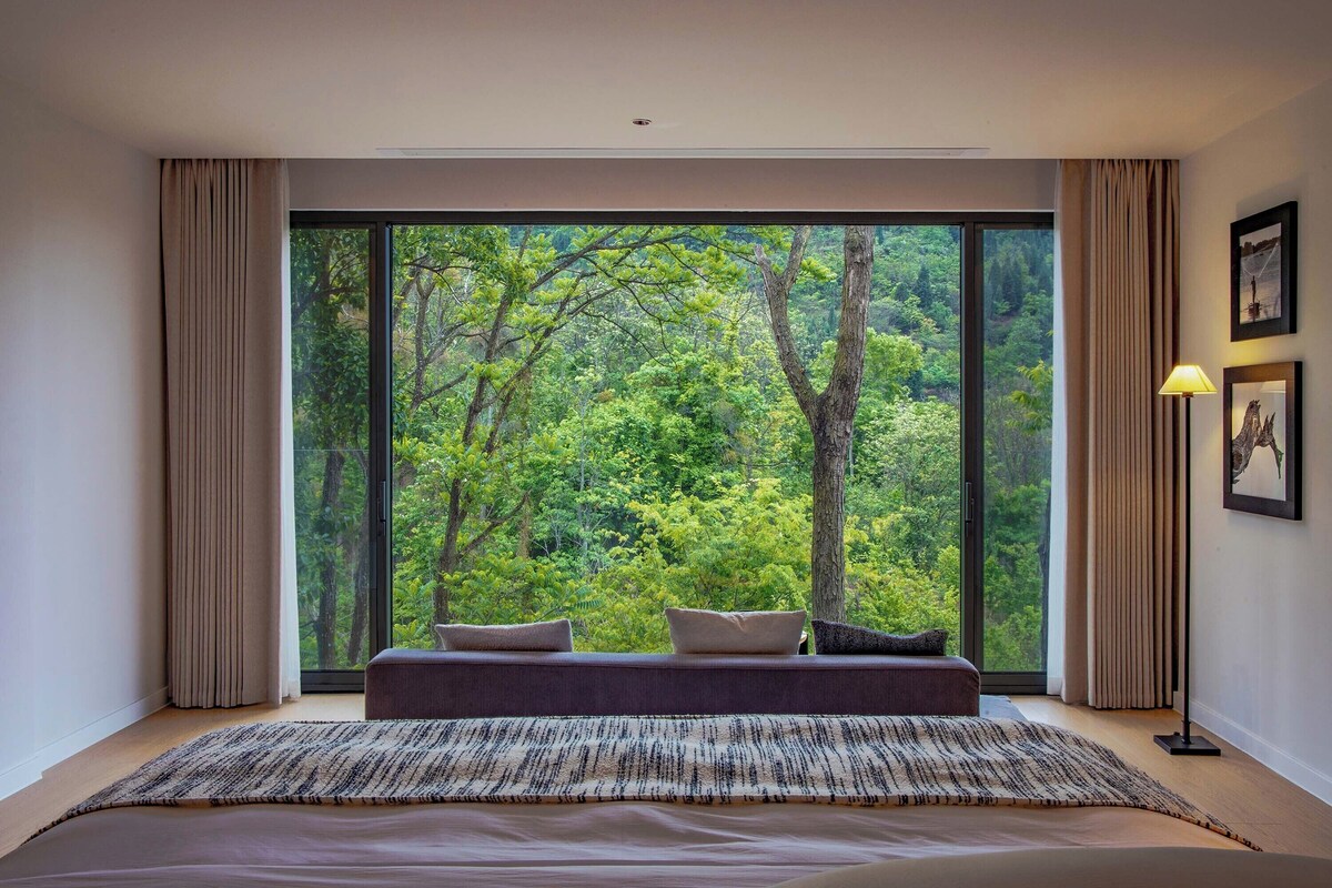 Premium bedding, desk, laptop workspace, blackout curtains