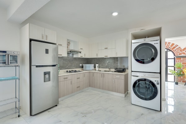 Coffee/tea maker, fridge, microwave, toaster
