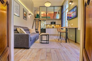 Departamento, vista a la ciudad | Área de sala de estar