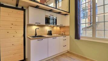 Departamento, vista a la ciudad | Cocina privada