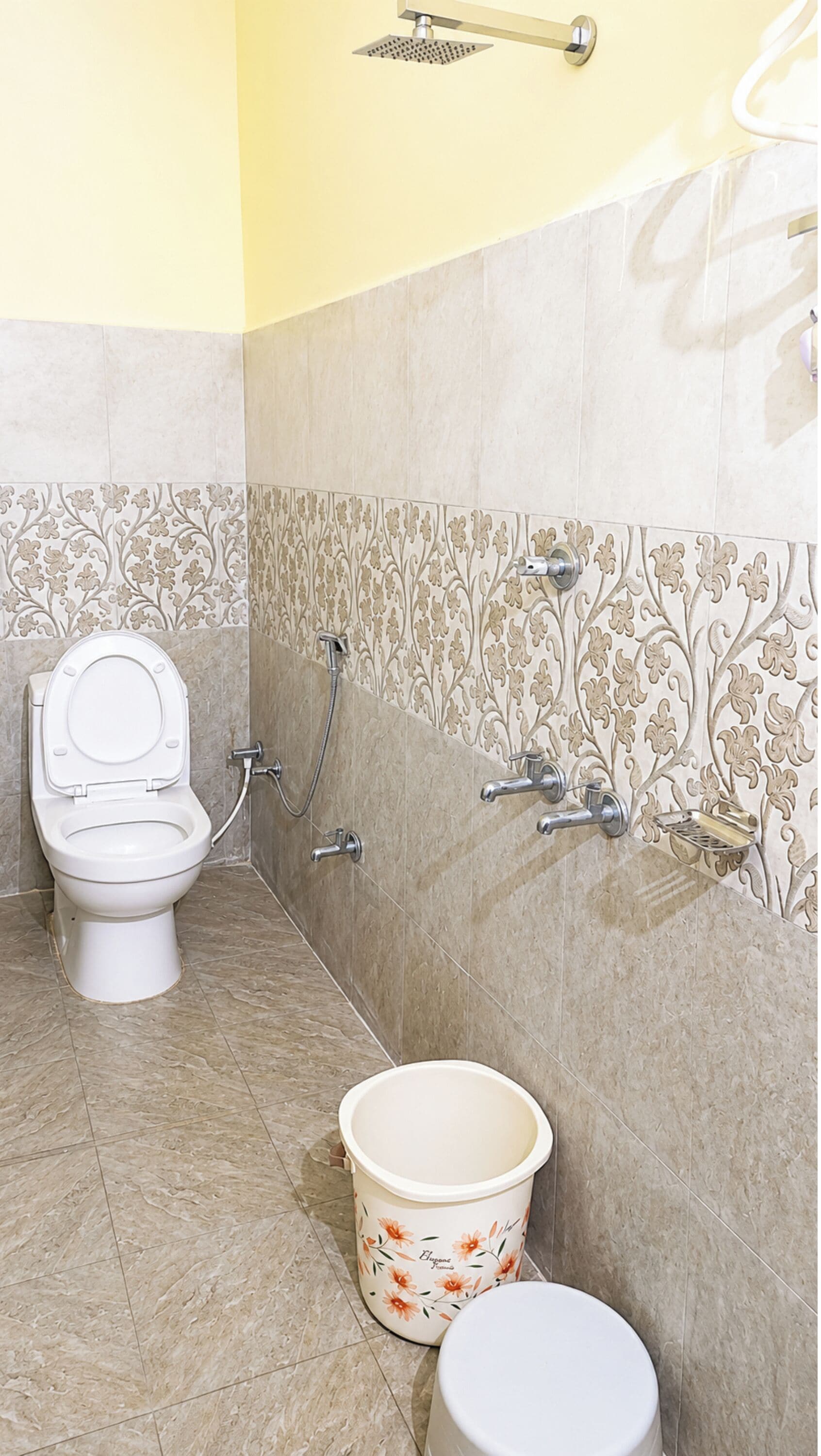 Shower, rainfall showerhead, slippers, towels
