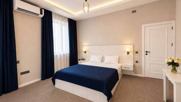 Deluxe Double Room, Balcony, City View | Desk, laptop workspace, blackout drapes, soundproofing