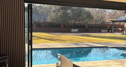 8 @ Mill Lane • Hartbeespoort Guesthouse • Hot Tub & Mountain Views