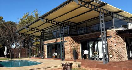 8 @ Mill Lane • Hartbeespoort Guesthouse • Hot Tub & Mountain Views