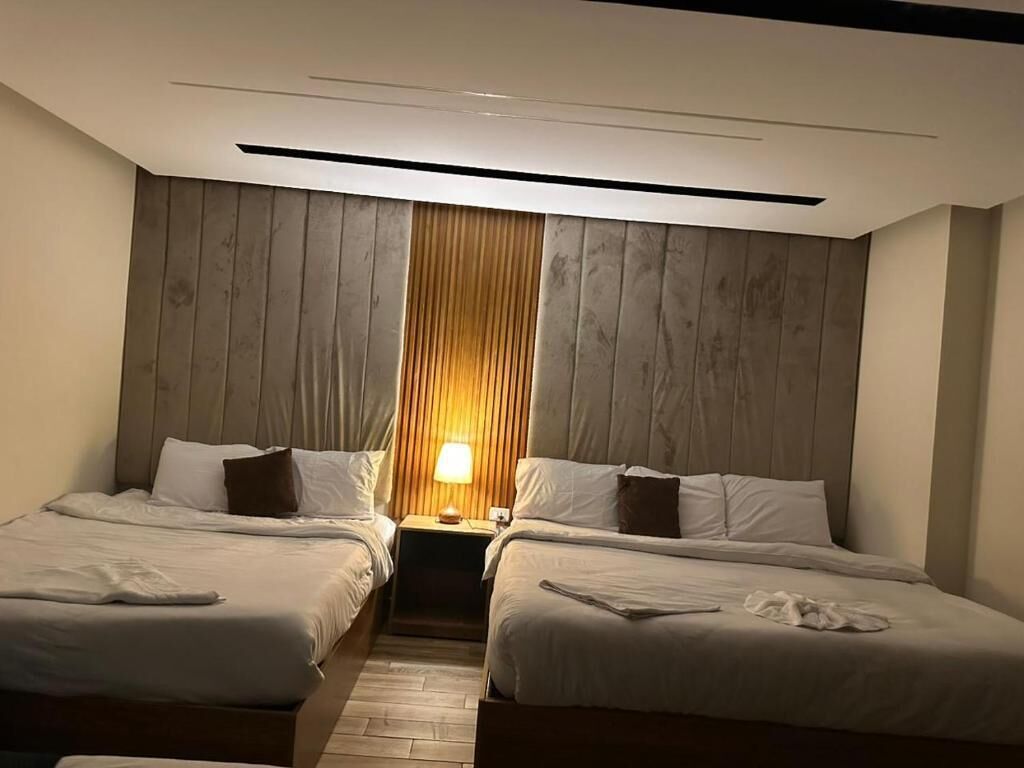 Quadruple Room, City View | In-room safe, desk, soundproofing, iron/ironing board