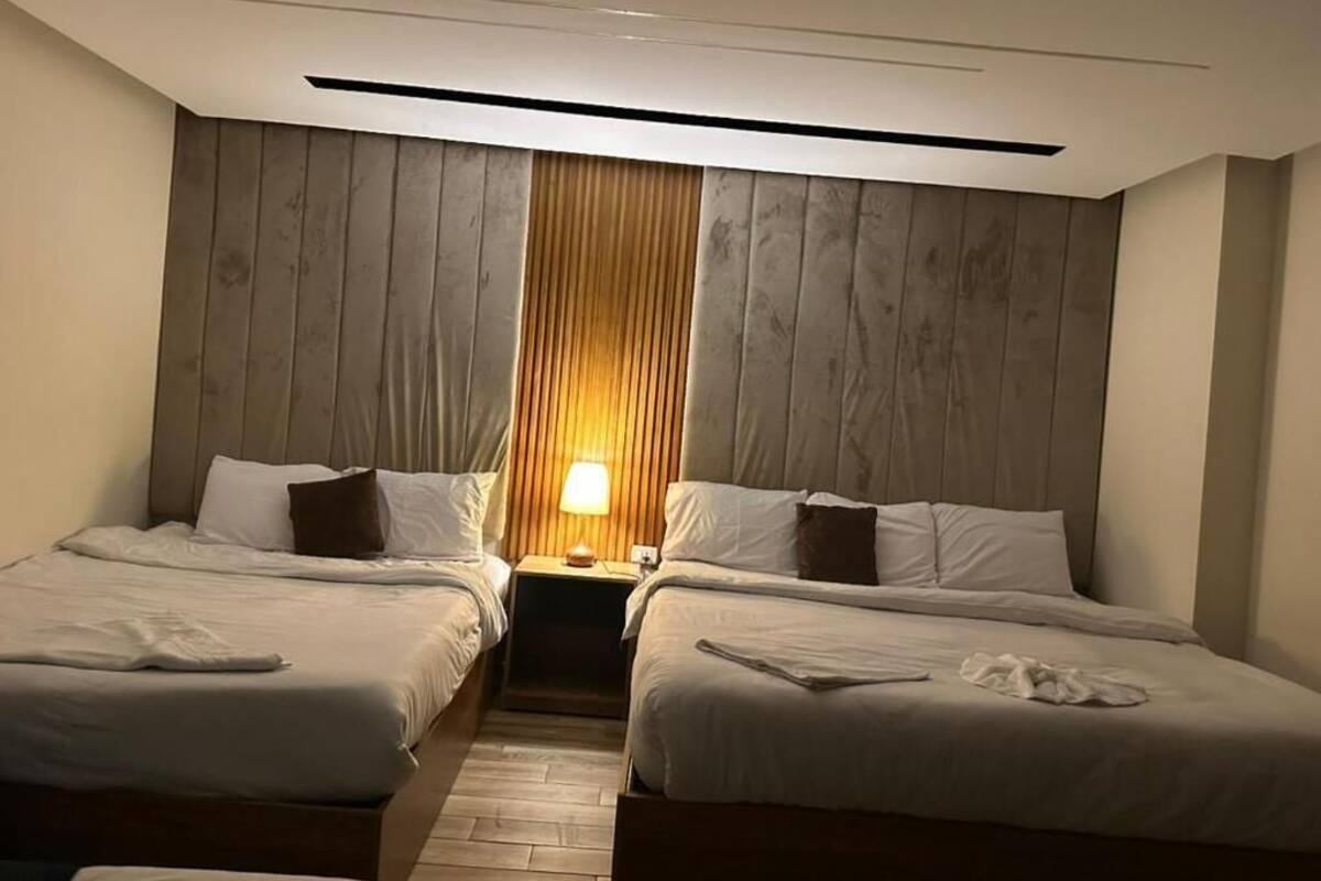 Quadruple Room, City View | In-room safe, desk, soundproofing, iron/ironing board