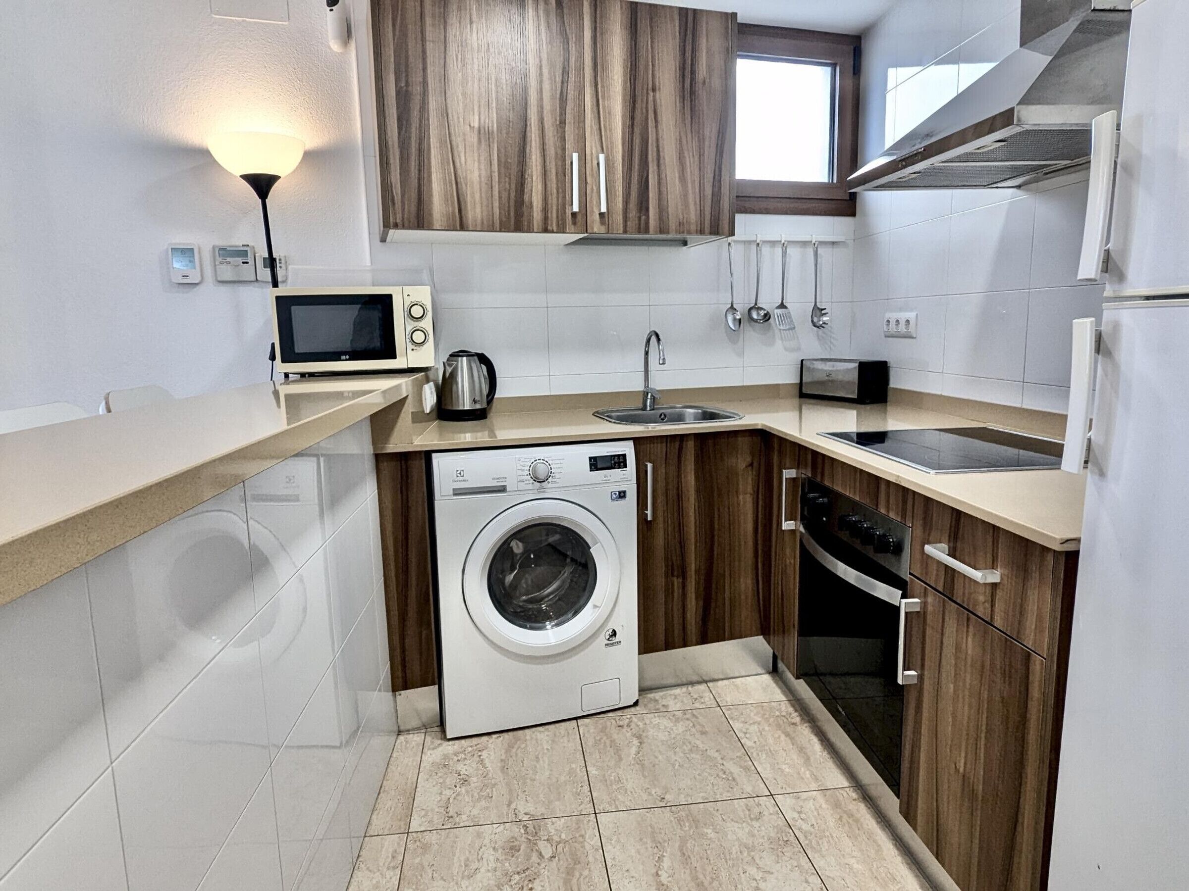 Coffee/tea maker, fridge, microwave, oven