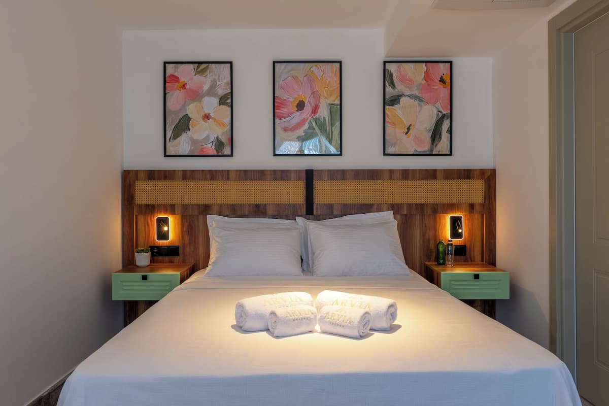 Family Triple Room, Balcony, Mountain View | In-room safe, soundproofing, WiFi (free)