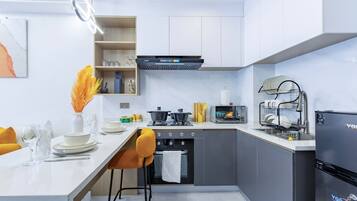 Departamento, balcón, vista a la ciudad | Cocina privada