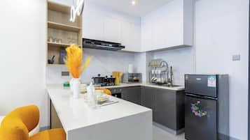 Departamento, balcón, vista a la ciudad | Cocina privada