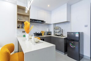 Departamento, balcón, vista a la ciudad | Cocina privada