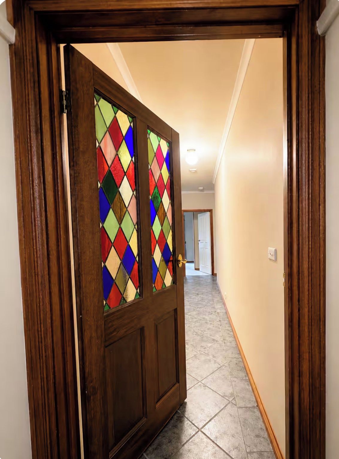 Hallway with stained glass door
