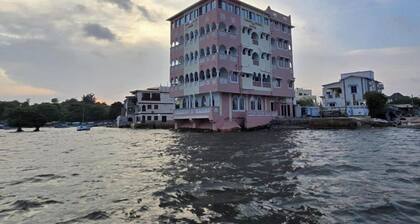 Discover the soul of Lamu at our authentic seafront retreat.