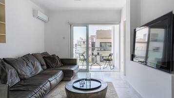 Apartment, Balcony, Beach View | Living area