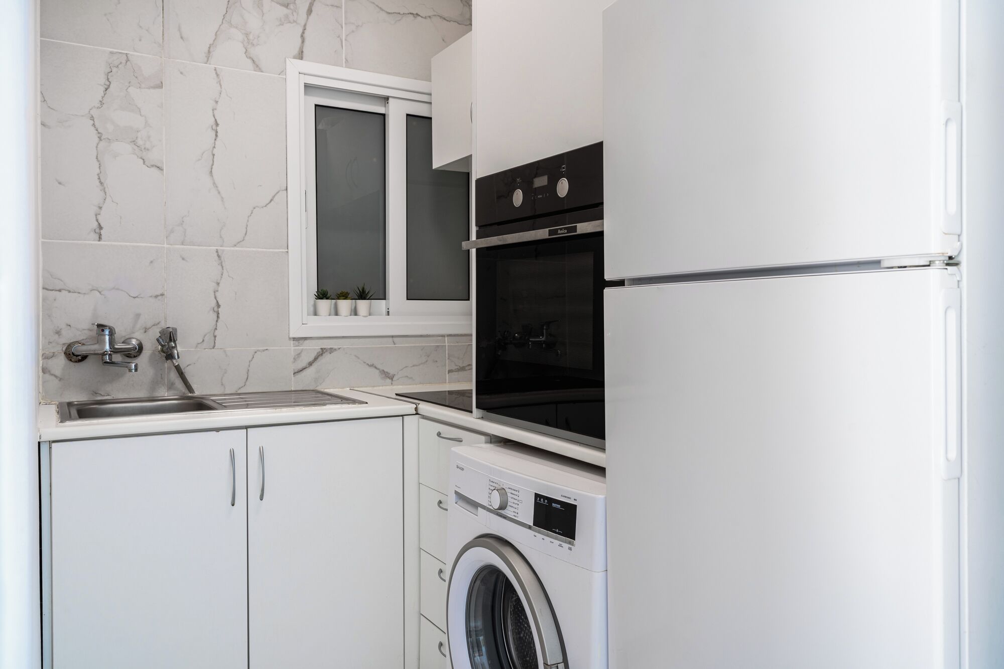 Appartement, balcon, vue sur la plage | Cuisine privée