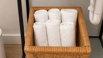 Hair dryer, towels, soap, shampoo