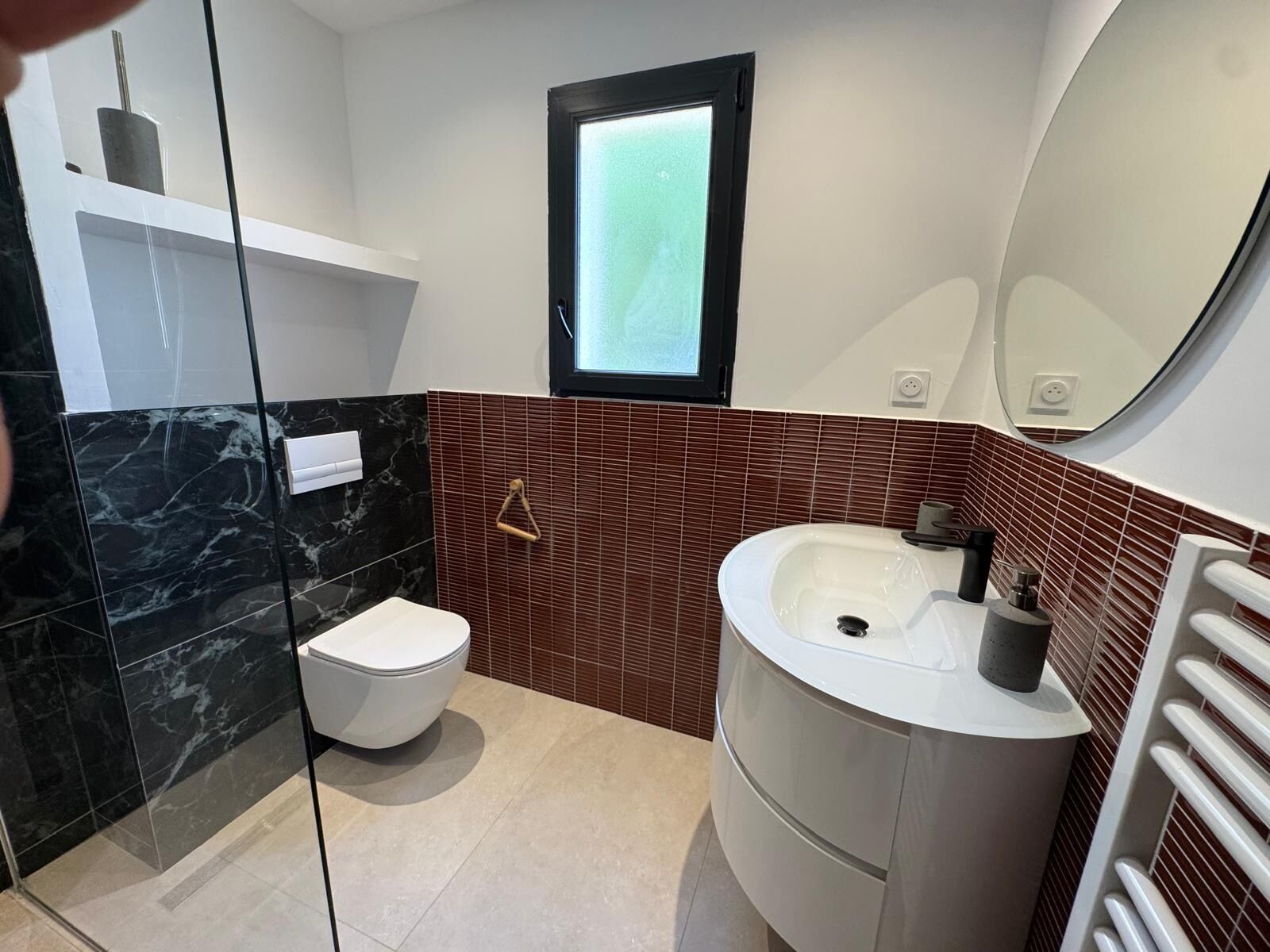 Shower, hair dryer, towels, toilet paper