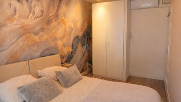 2 quartos, ferros/tábuas de passar roupa, Wi-Fi, roupa de cama
