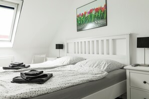 Een strijkplank/strijkijzer, gratis wifi, beddengoed