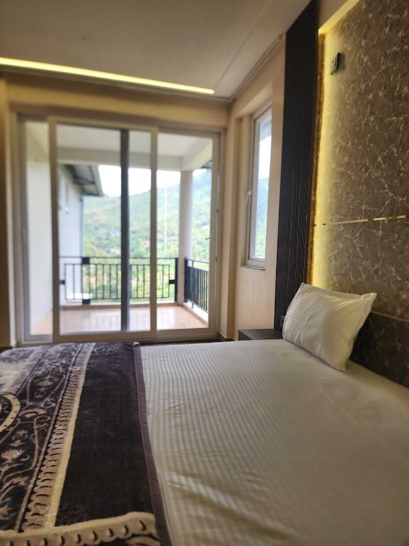 Departamento Deluxe, vista a la montaña | Escritorio, espacio para trabajar con laptop y wifi gratis