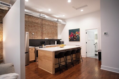 Stay in the Heart of the Historic 100 Block