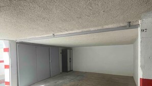 A vacant room with a concrete floor, a door, and a wall with a number. - Beachfront apartment with pool, parking & sea view, Gandia (Grau i Platja)