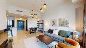 A modern living room with a sofa, coffee table, and dining area. - Elevated 1 Bed on 34th Floor l City View l Marina (Dubai Marina)