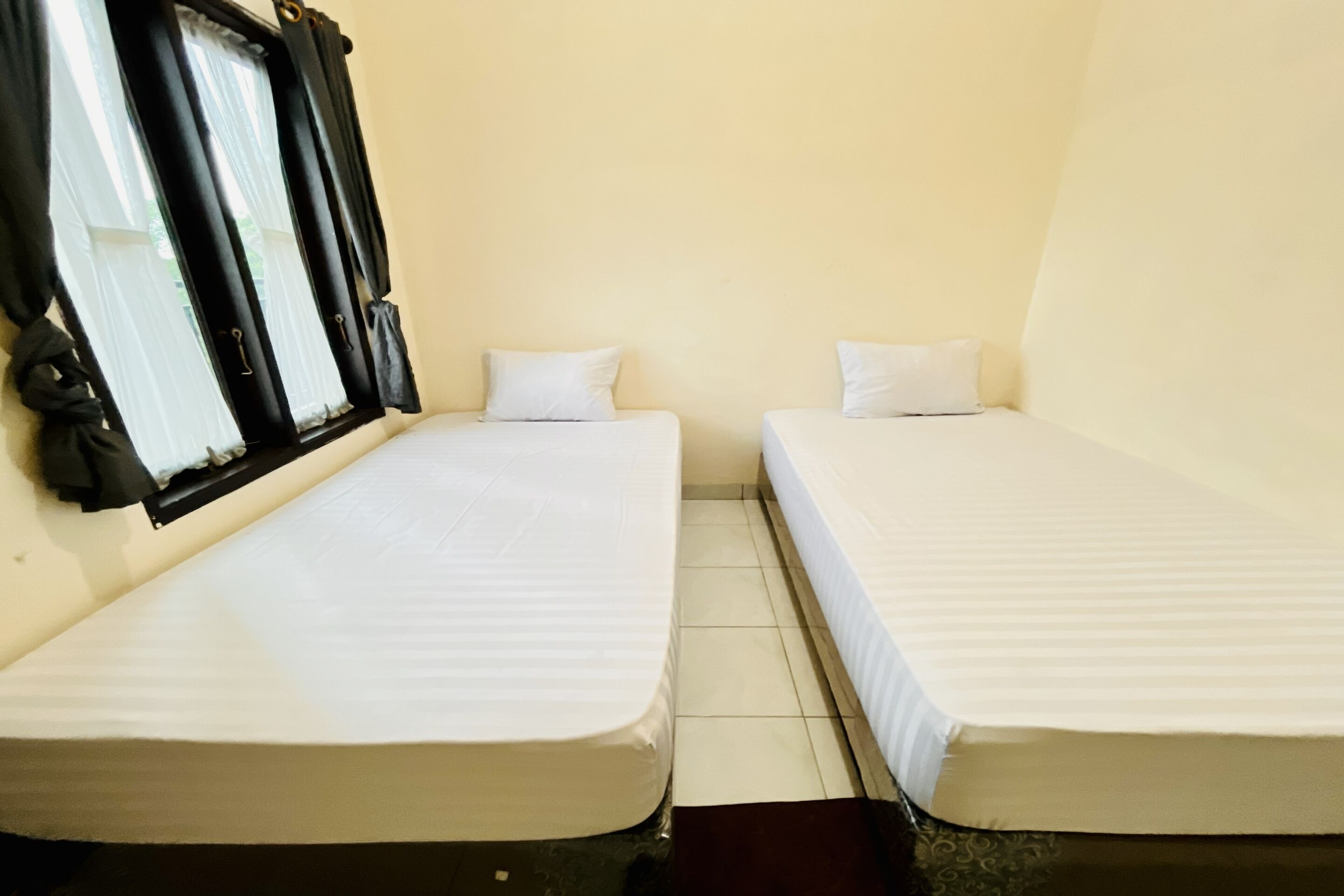 Chambre Deluxe avec lits jumeaux | Wi-Fi gratuit, draps fournis