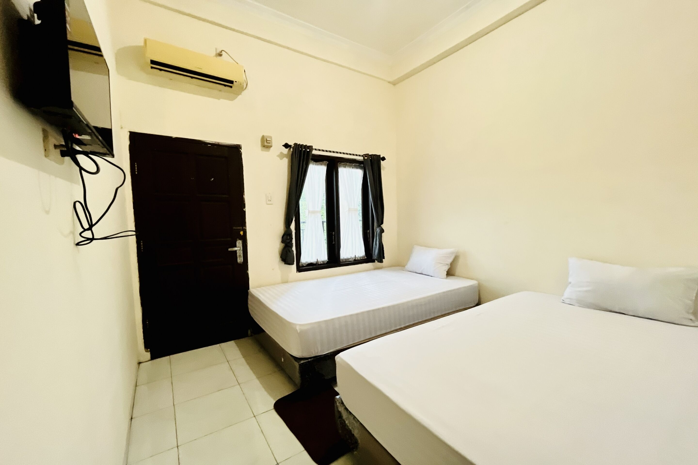 Habitación Deluxe con 2 camas individuales | Wifi gratis y ropa de cama