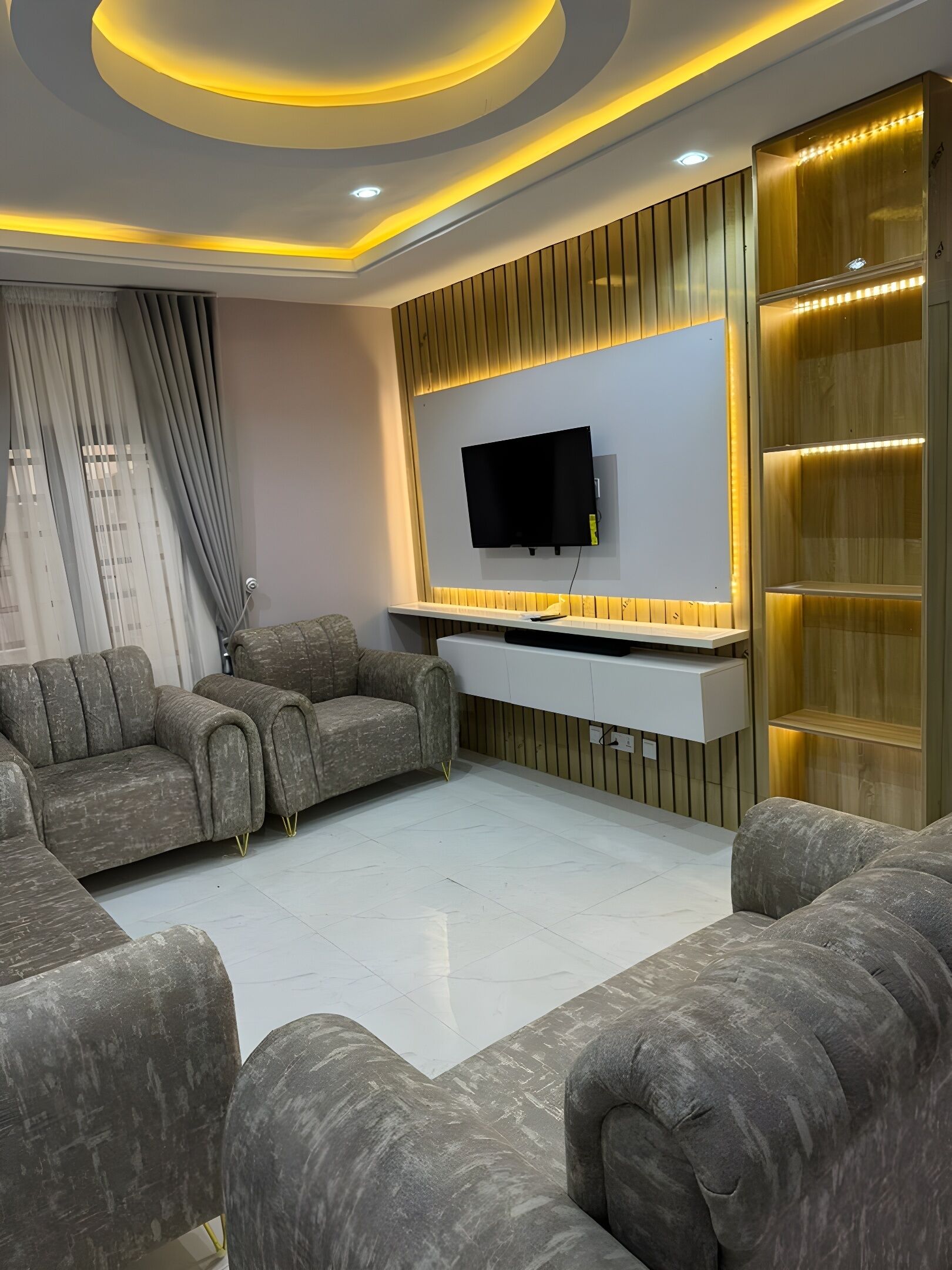 Suite ejecutiva, balcón, vista a la ciudad | Área de sala de estar