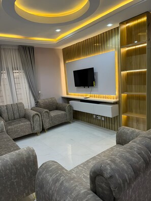 Executive Suite, Balcony, City View | Living area - Orbit Meridian Leisure and Suites (Ota)