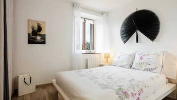 2 habitaciones, tabla de planchar con plancha, wifi y ropa de cama