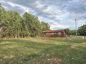 Exterior - Secluded, rustic 1-bedroom cabin w/ loft located on working ranch in Rapid City (Rapid City)
