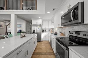 Private kitchen - The Salted Rim | Sound Sunsets • 2-Min Walk to Beach • Bikes • Family Fun (Surf City)