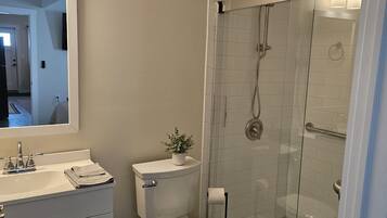Shower, towels, toilet paper