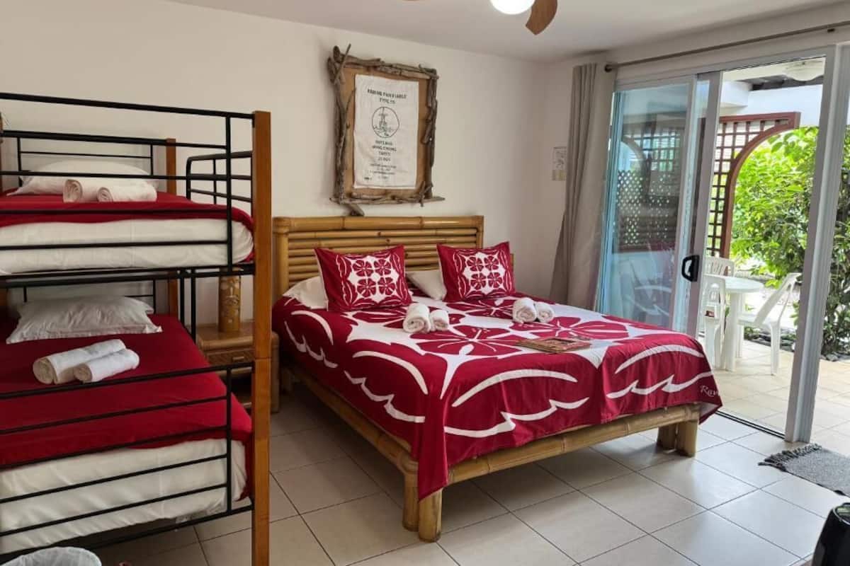 Family Room, Garden View | In-room safe, blackout curtains, free WiFi
