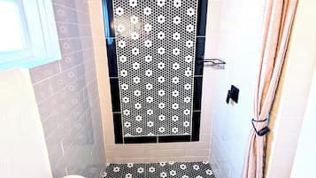 Shower, towels, toilet paper
