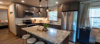 4-bedroom ranch home featuring open concept and convenient central location