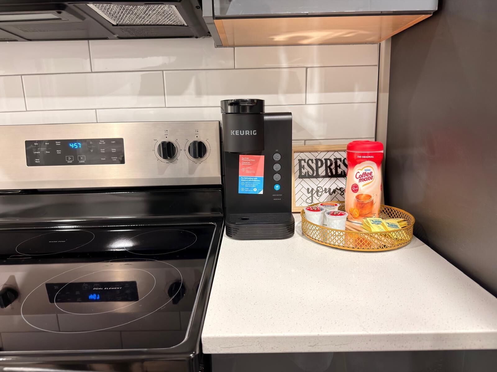 Coffee/tea maker, fridge, microwave, oven
