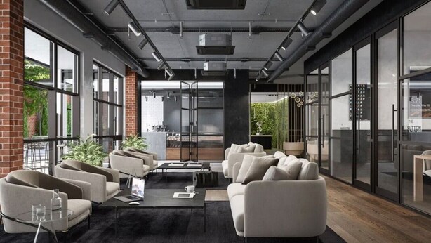 Uma área de estar moderna com sofás, uma mesa de centro e vista para a área externa.